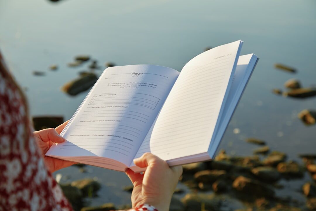 person journaling in morning light