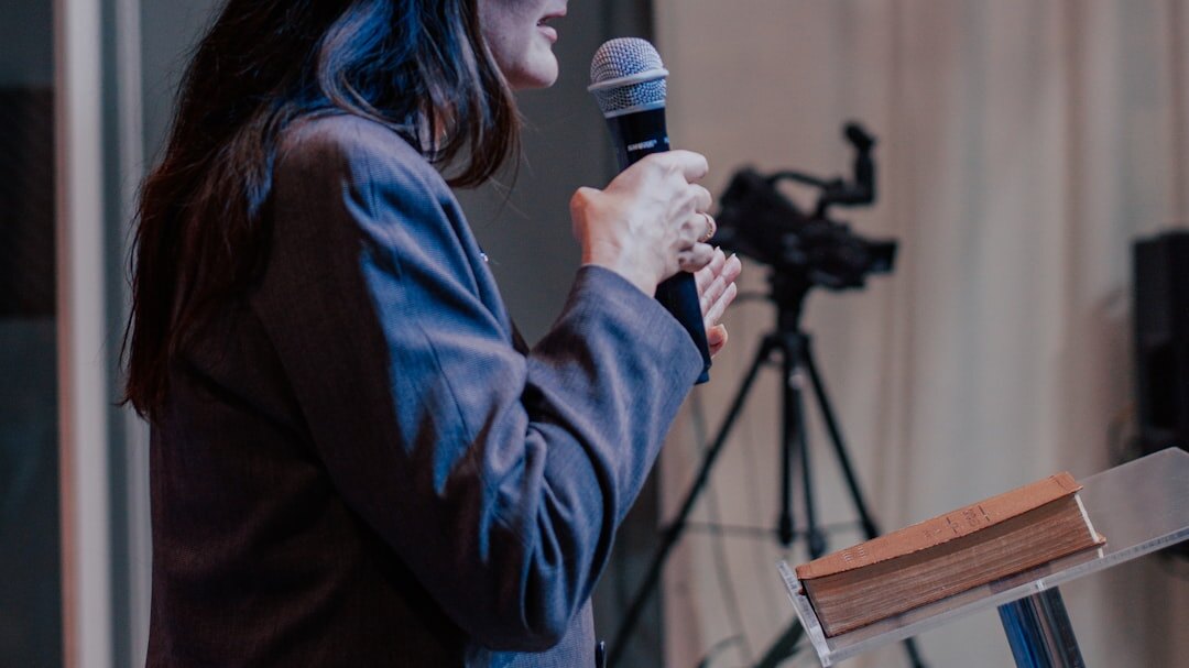 confident speaker on stage