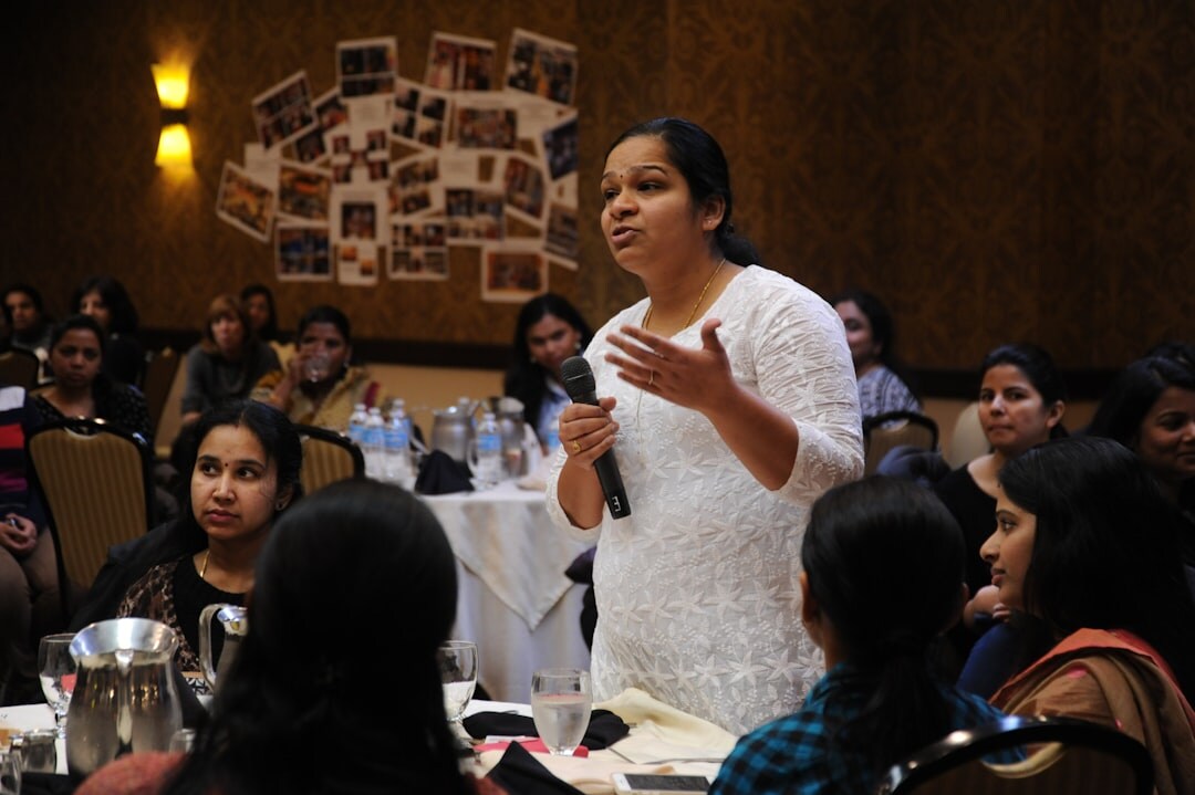confident person speaking in meeting