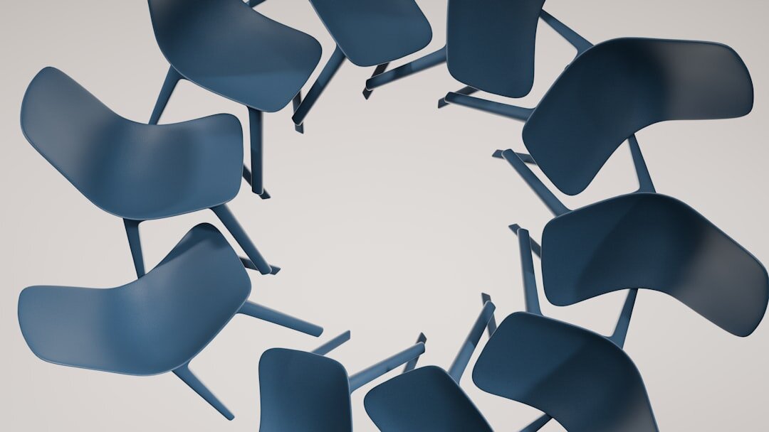 Diverse group sitting in a circle during a discussion workshop